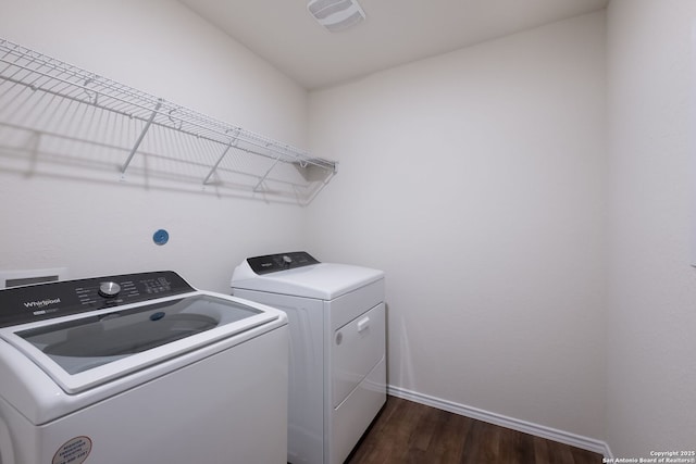 13735 Prospector Post, San Antonio, TX 78253 - washroom with washer and clothes dryer, dark wood-type flooring, and baseboards