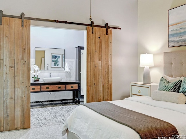 19914 Encino Moss, San Antonio, TX 78259 - bedroom with a barn door and a sink