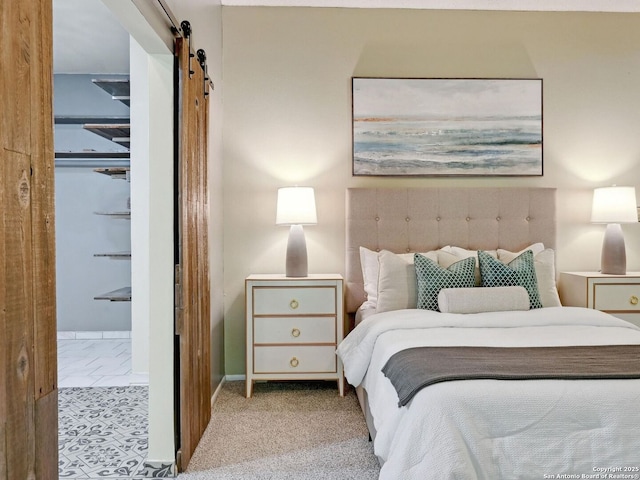 19914 Encino Moss, San Antonio, TX 78259 - bedroom featuring a barn door and baseboards