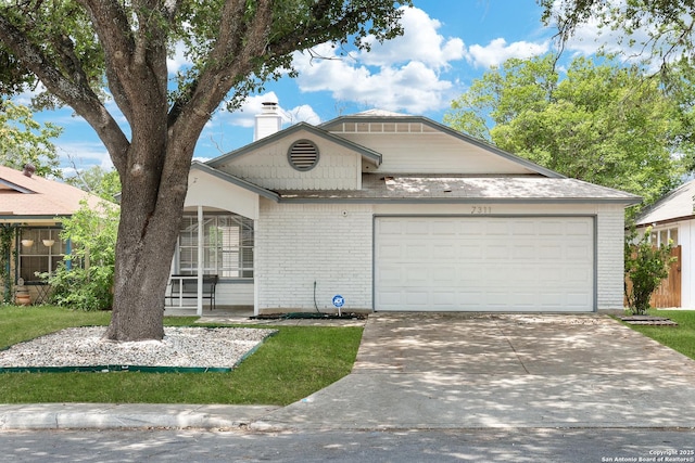 7311 Lansbury Dr, San Antonio, TX 78250 - view of front of property featuring a chimney, brick siding, a garage, and driveway