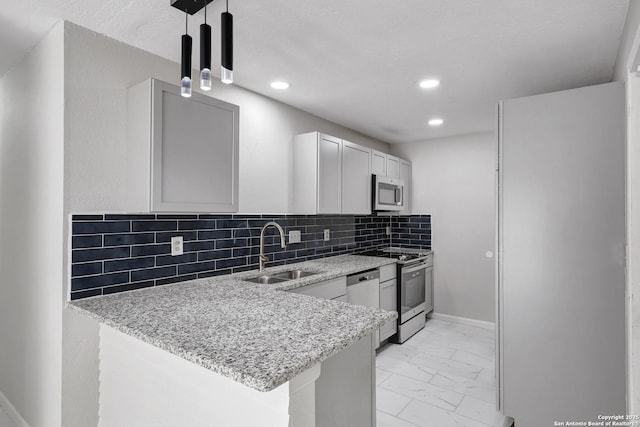 7311 Lansbury Dr, San Antonio, TX 78250 - kitchen featuring a sink, stainless steel appliances, light marble finish floors, light stone countertops, and recessed lighting