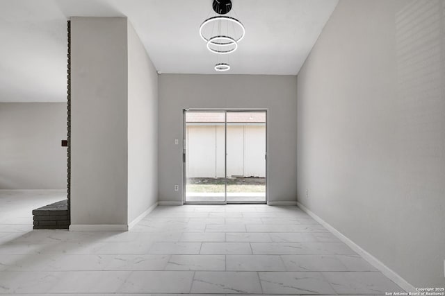 7311 Lansbury Dr, San Antonio, TX 78250 - unfurnished room featuring marble look tiles and baseboards