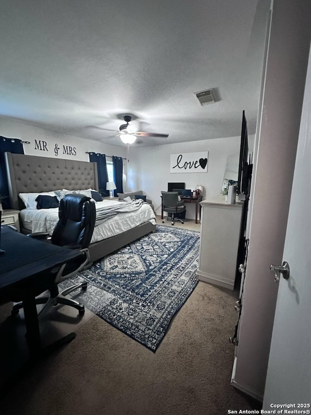 510 Tres Caminos, San Antonio, TX 78245 - carpeted bedroom with an office area and ceiling fan