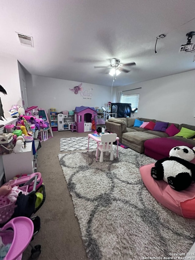 510 Tres Caminos, San Antonio, TX 78245 - living area featuring carpet flooring and a ceiling fan