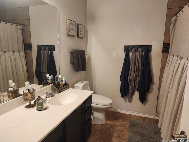 510 Tres Caminos, San Antonio, TX 78245 - full bathroom featuring toilet, vanity, a shower with shower curtain, and baseboards