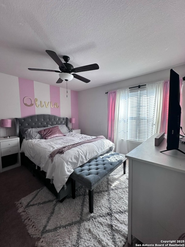510 Tres Caminos, San Antonio, TX 78245 - bedroom with a textured ceiling, ceiling fan, and carpet flooring