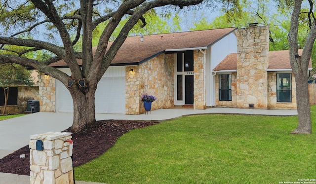 2926 Quail Oak, San Antonio, TX 78232 - mid-century inspired home featuring stone siding, driveway, roof with shingles, a front lawn, and a chimney