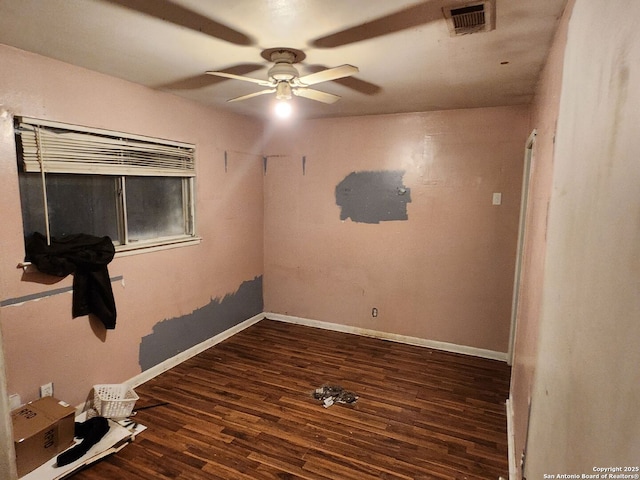 4731 Castle Queen, San Antonio, TX 78218 - spare room featuring a ceiling fan, wood finished floors, and baseboards
