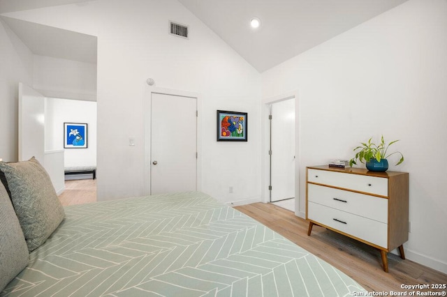 430 Burleson, San Antonio, TX 78202 - bedroom featuring wood finished floors, high vaulted ceiling, baseboards, and recessed lighting