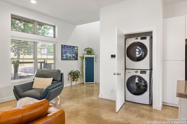 430 Burleson, San Antonio, TX 78202 - laundry room with estacked washer and dryer, baseboards, and recessed lighting