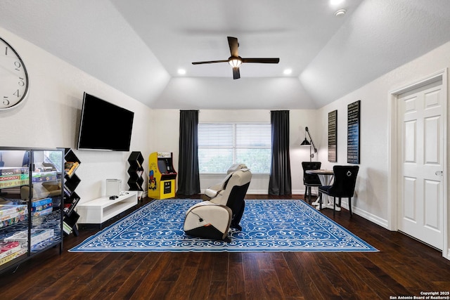 11 Gemsbuck Rise, San Antonio, TX 78258 - living area featuring vaulted ceiling, ceiling fan, wood finished floors, and baseboards