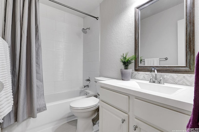 11 Gemsbuck Rise, San Antonio, TX 78258 - full bathroom with a textured wall, shower / bath combination with curtain, vanity, toilet, and backsplash