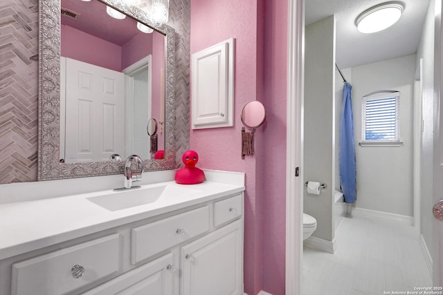 11 Gemsbuck Rise, San Antonio, TX 78258 - full bathroom with vanity, toilet, and shower / bath combo