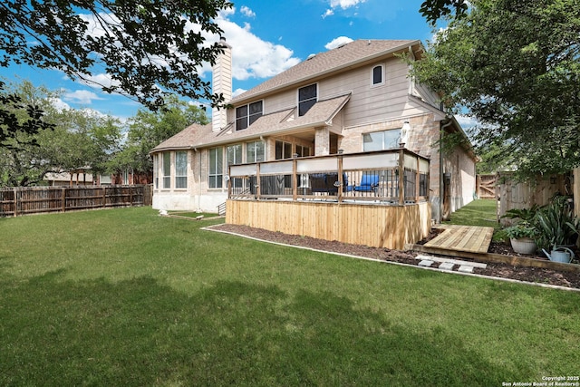 11 Gemsbuck Rise, San Antonio, TX 78258 - rear view of property featuring a chimney, a deck, and brick siding