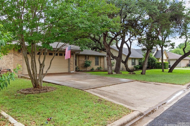 305 Rockmoor Dr, Georgetown, TX 78628 - ranch-style house with an attached garage, driveway, a front lawn, and brick siding