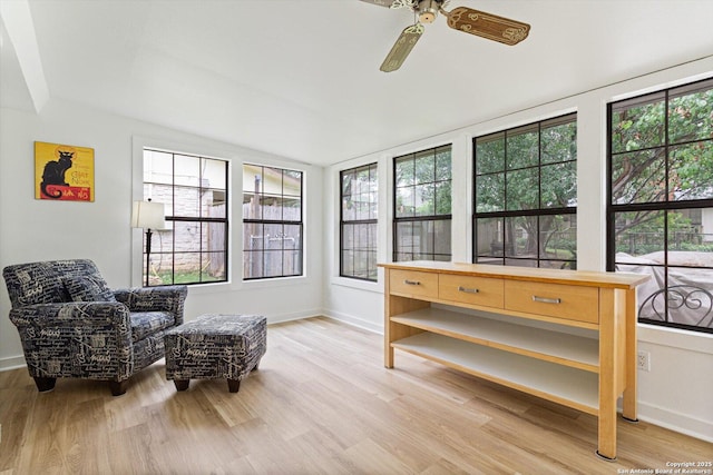 305 Rockmoor Dr, Georgetown, TX 78628 - living area with light wood-style floors, ceiling fan, and baseboards