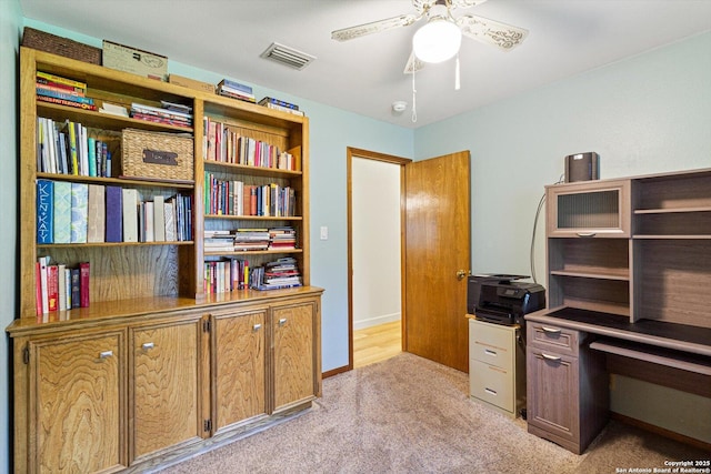 305 Rockmoor Dr, Georgetown, TX 78628 - office featuring light carpet, ceiling fan, and baseboards