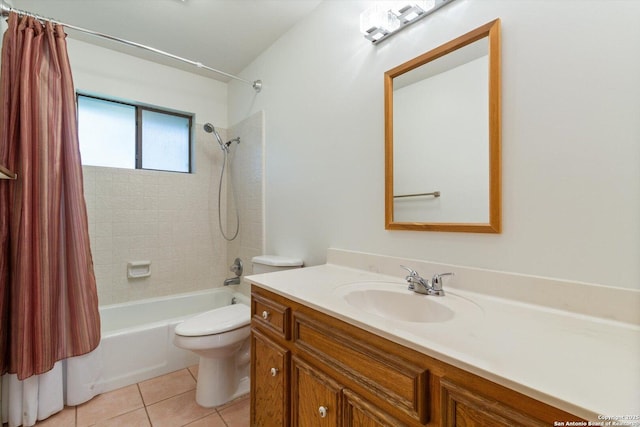 305 Rockmoor Dr, Georgetown, TX 78628 - bathroom featuring shower / bath combo with shower curtain, vanity, toilet, and tile patterned flooring