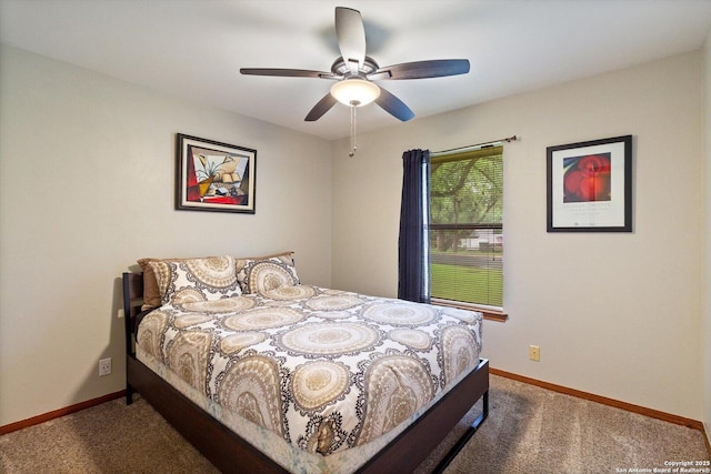 305 Rockmoor Dr, Georgetown, TX 78628 - carpeted bedroom with baseboards and ceiling fan