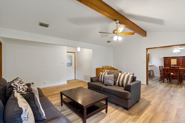 305 Rockmoor Dr, Georgetown, TX 78628 - living room with ceiling fan, light wood finished floors, and baseboards