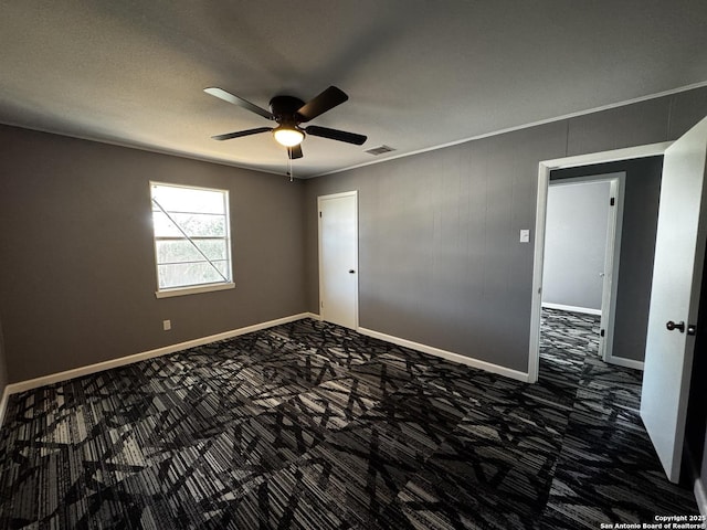 19518 Florence, Lytle, TX 78052 - carpeted spare room with a ceiling fan and baseboards