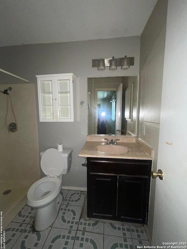 4402 Dove Spgs, Austin, TX 78744 - bathroom featuring toilet, tile patterned floors, a shower, and vanity