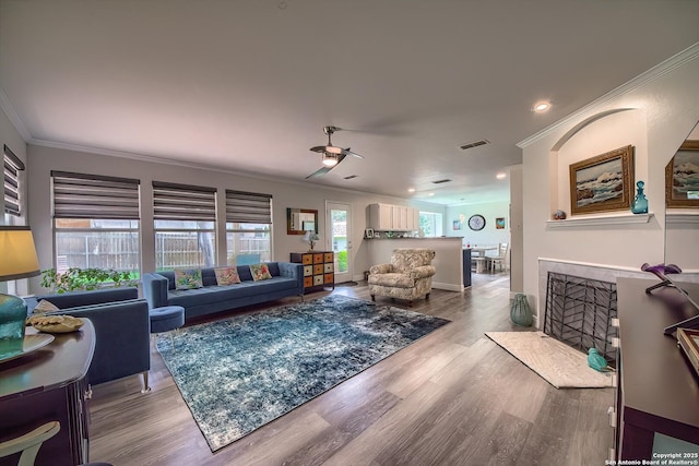 3512 Mcalister, Schertz, TX 78154 - living room with crown molding, wood finished floors, ceiling fan, and recessed lighting