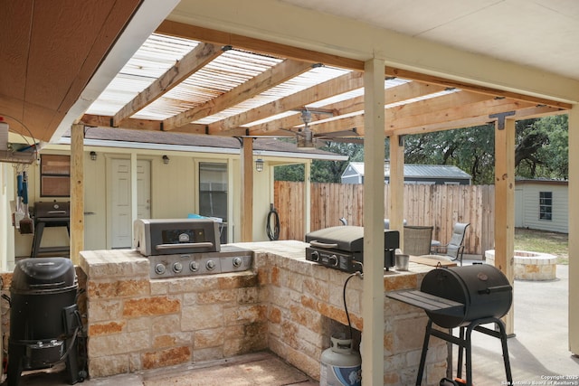 102 Southgate, Pleasanton, TX 78064 - view of patio with a pergola and an outdoor structure