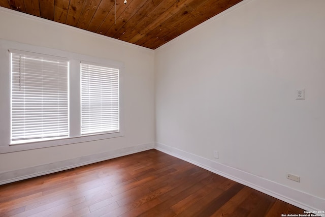 721 W Kings Hwy, San Antonio, TX 78212 - spare room featuring wood ceiling, crown molding, baseboards, and dark wood-style flooring