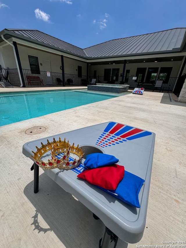 34 Lazy Day, Concan, TX 78838 - community pool with a patio area