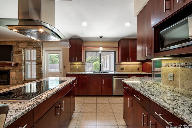 2102 Oak Wild St, San Antonio, TX 78232 - kitchen with black electric stovetop, island exhaust hood, dishwasher, backsplash, and light tile patterned floors