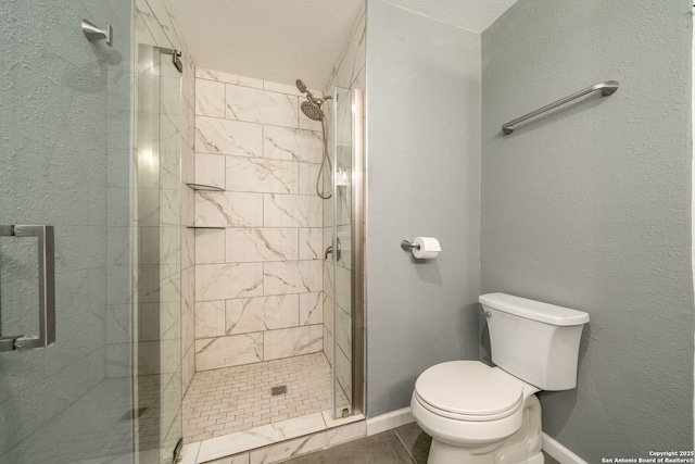 2102 Oak Wild St, San Antonio, TX 78232 - full bath with toilet, a shower stall, tile patterned floors, and baseboards
