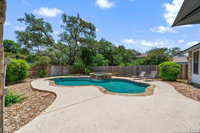 2102 Oak Wild St, San Antonio, TX 78232 - view of pool with a patio, a fenced backyard, and a pool with connected hot tub