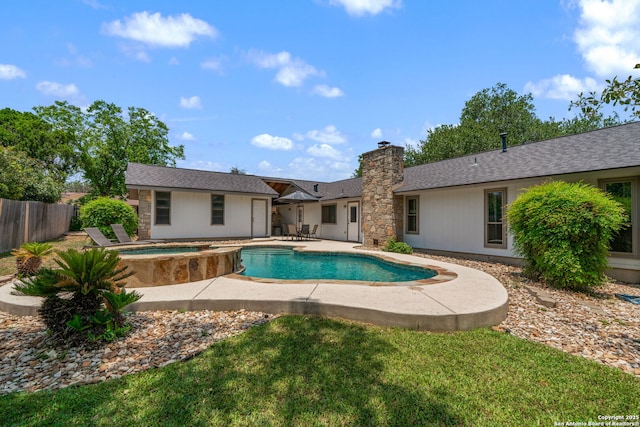 2102 Oak Wild St, San Antonio, TX 78232 - rear view of property with a patio, a chimney, roof with shingles, and a pool with connected hot tub