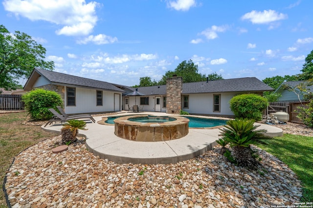 2102 Oak Wild St, San Antonio, TX 78232 - view of swimming pool featuring a fenced backyard, a patio, and a pool with connected hot tub