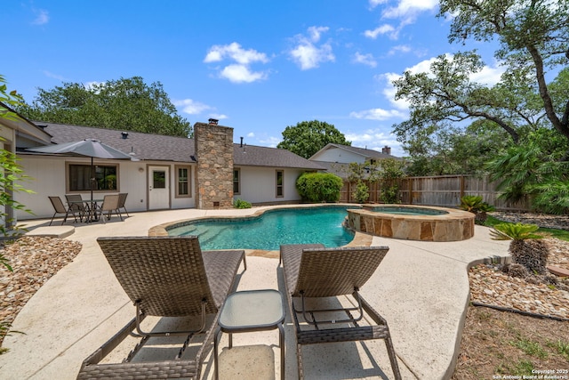 2102 Oak Wild St, San Antonio, TX 78232 - view of pool with a patio area, a fenced backyard, and a pool with connected hot tub