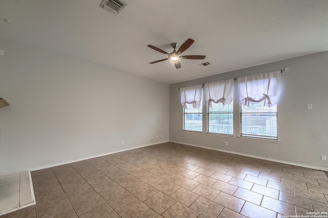 112 Springtree Bnd, Cibolo, TX 78108 - tiled empty room featuring ceiling fan and baseboards