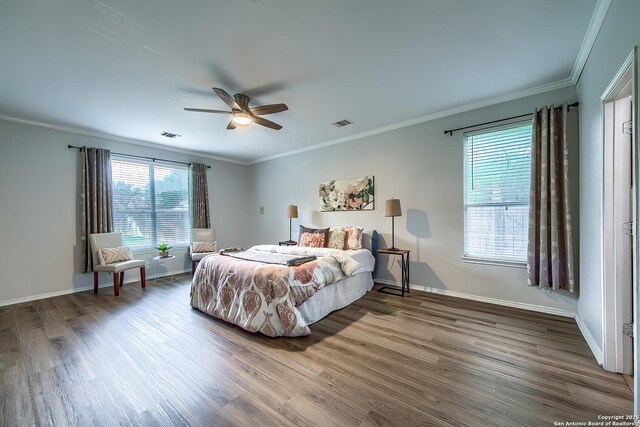 112 Springtree Bnd, Cibolo, TX 78108 - bedroom featuring ornamental molding, wood finished floors, baseboards, and ceiling fan
