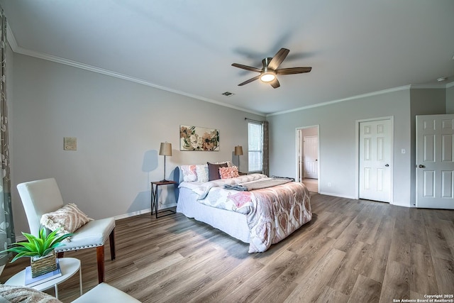112 Springtree Bnd, Cibolo, TX 78108 - bedroom featuring wood finished floors, ornamental molding, baseboards, and a ceiling fan