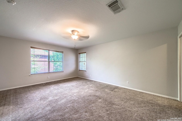 112 Springtree Bnd, Cibolo, TX 78108 - carpeted empty room with ceiling fan, baseboards, and a textured ceiling