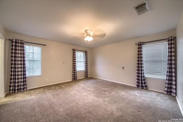 112 Springtree Bnd, Cibolo, TX 78108 - empty room with carpet, ceiling fan, baseboards, and a textured ceiling