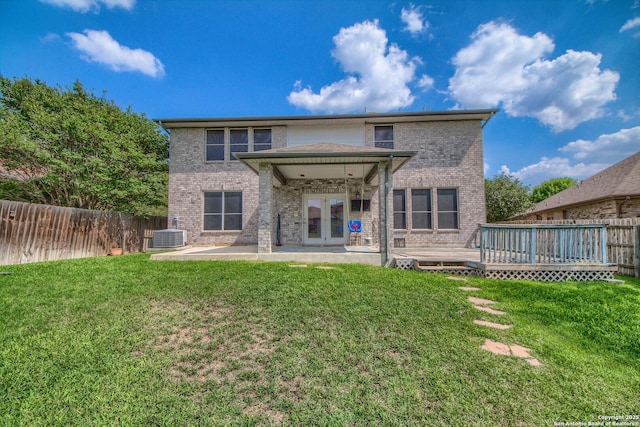 112 Springtree Bnd, Cibolo, TX 78108 - back of house with brick siding, a wooden deck, and a patio