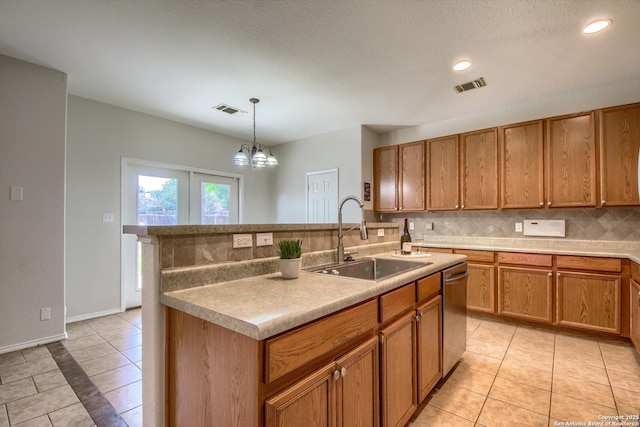 112 Springtree Bnd, Cibolo, TX 78108 - kitchen with a sink, tasteful backsplash, light tile patterned floors, a chandelier, and recessed lighting