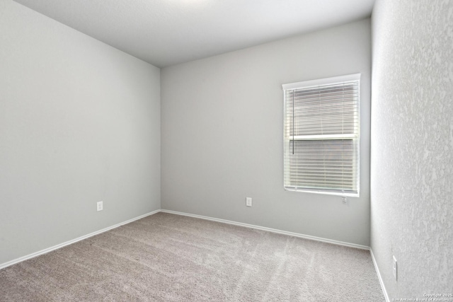 7150 Pisces, Converse, TX 78109 - empty room with carpet flooring and baseboards
