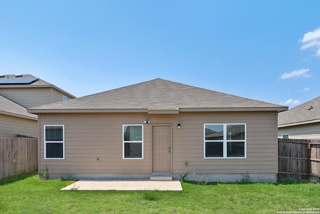 7150 Pisces, Converse, TX 78109 - rear view of property with a patio area and roof with shingles