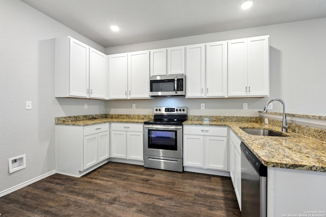 7150 Pisces, Converse, TX 78109 - kitchen featuring stainless steel appliances, a sink, light stone counters, white cabinetry, and recessed lighting