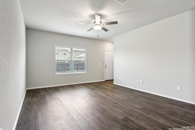 7150 Pisces, Converse, TX 78109 - unfurnished room featuring ceiling fan, dark wood-style floors, and baseboards