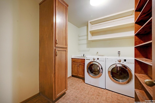 29241 Seabiscuit, Boerne, TX 78015 - washroom featuring independent washer and dryer, cabinet space, light floors, and baseboards