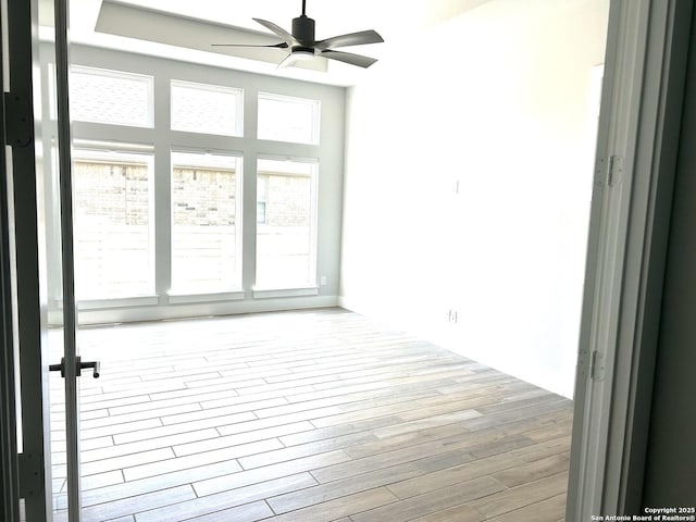 1185 Abelia, New Braunfels, TX 78132 - empty room with a ceiling fan and wood finished floors