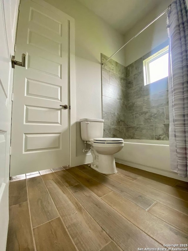 1185 Abelia, New Braunfels, TX 78132 - bathroom with hardwood / wood-style flooring, shower / bath combo, and toilet